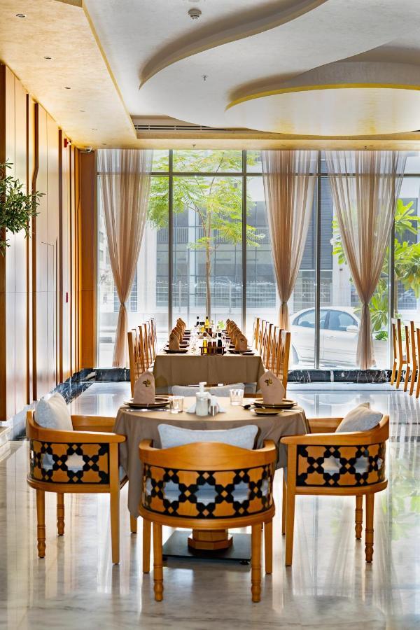 Luxe Grand Hotel Apartments Sharjah Exteriör bild The restaurant