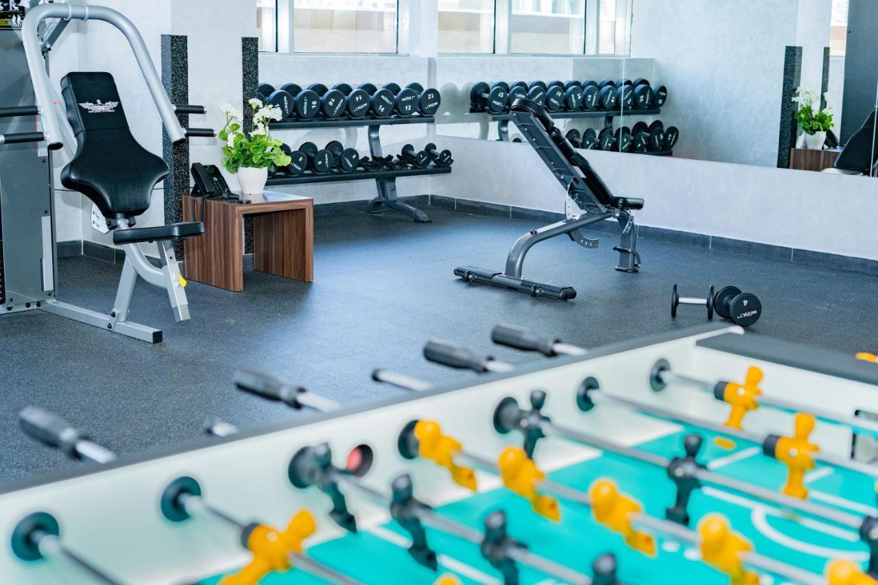 Luxe Grand Hotel Apartments Sharjah Exteriör bild The gym at the hotel