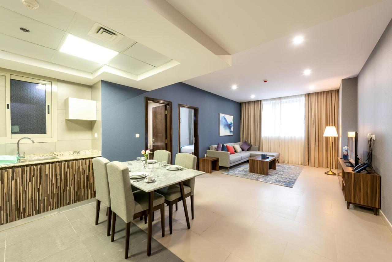 Luxe Grand Hotel Apartments Sharjah Exteriör bild A typical apartment at the complex