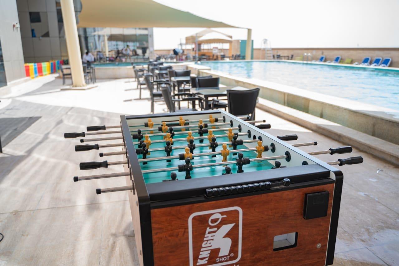 Luxe Grand Hotel Apartments Sharjah Exteriör bild A foosball table