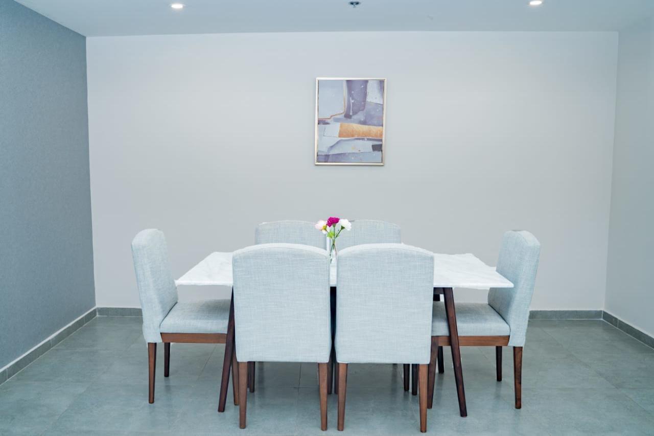 Luxe Grand Hotel Apartments Sharjah Exteriör bild A dining room