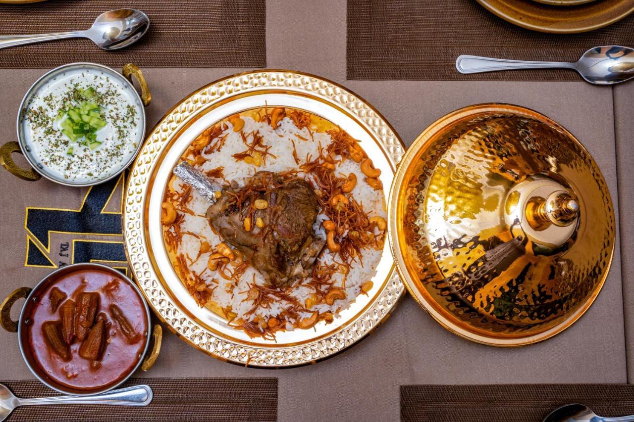 Luxe Grand Hotel Apartments Sharjah Exteriör bild Hyderabadi biryani