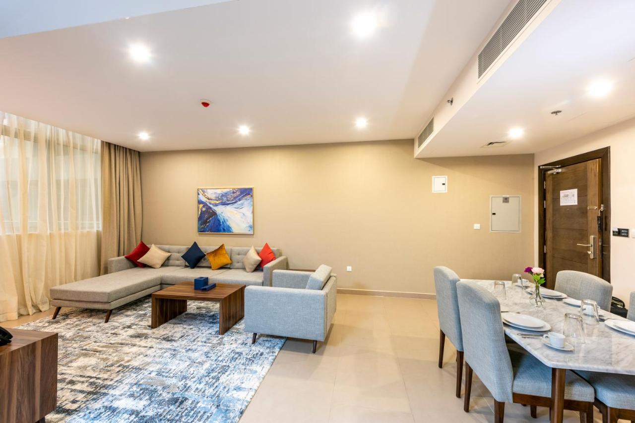 Luxe Grand Hotel Apartments Sharjah Exteriör bild A living room at the hotel