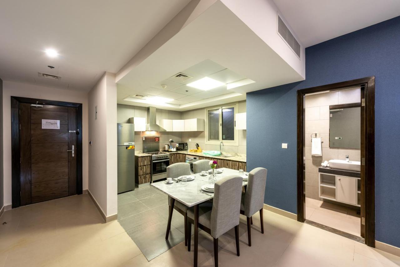 Luxe Grand Hotel Apartments Sharjah Exteriör bild A typical apartment at the complex