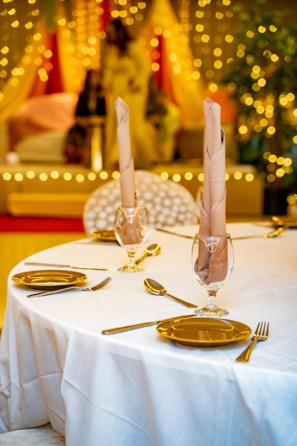 Luxe Grand Hotel Apartments Sharjah Exteriör bild A table set for a meal