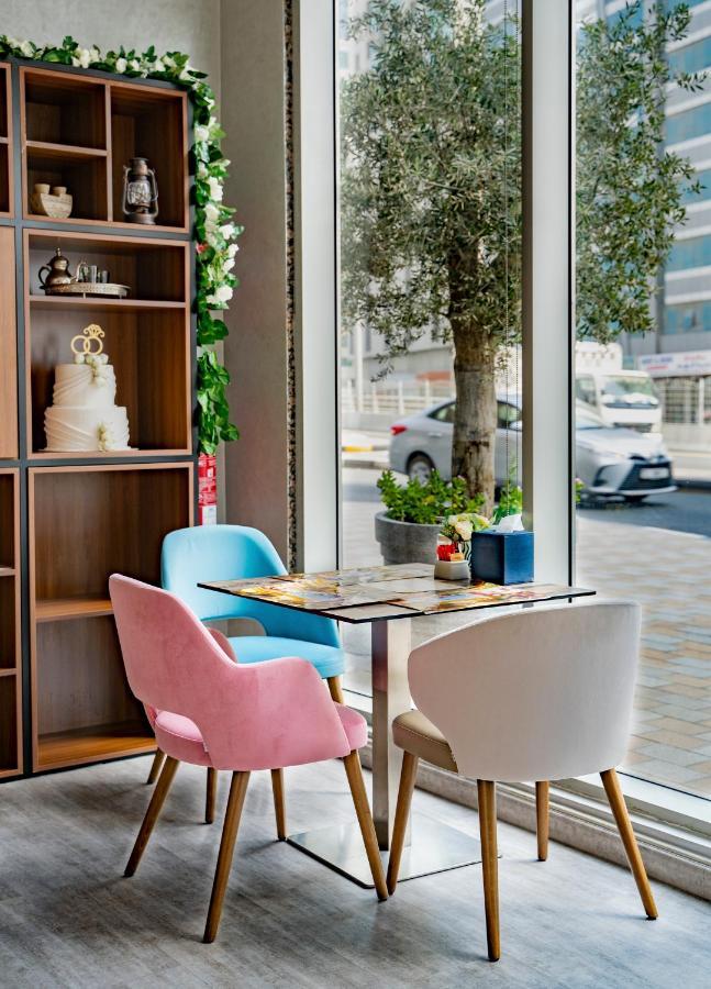 Luxe Grand Hotel Apartments Sharjah Exteriör bild The interior of the restaurant