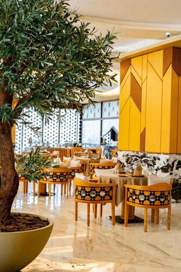 Luxe Grand Hotel Apartments Sharjah Exteriör bild The restaurant
