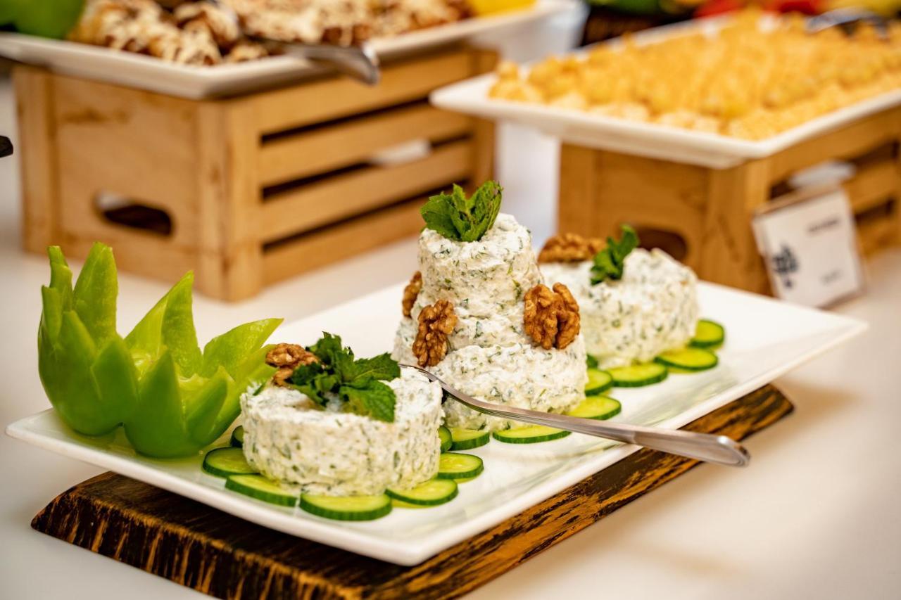 Luxe Grand Hotel Apartments Sharjah Exteriör bild Blue cheese with walnuts